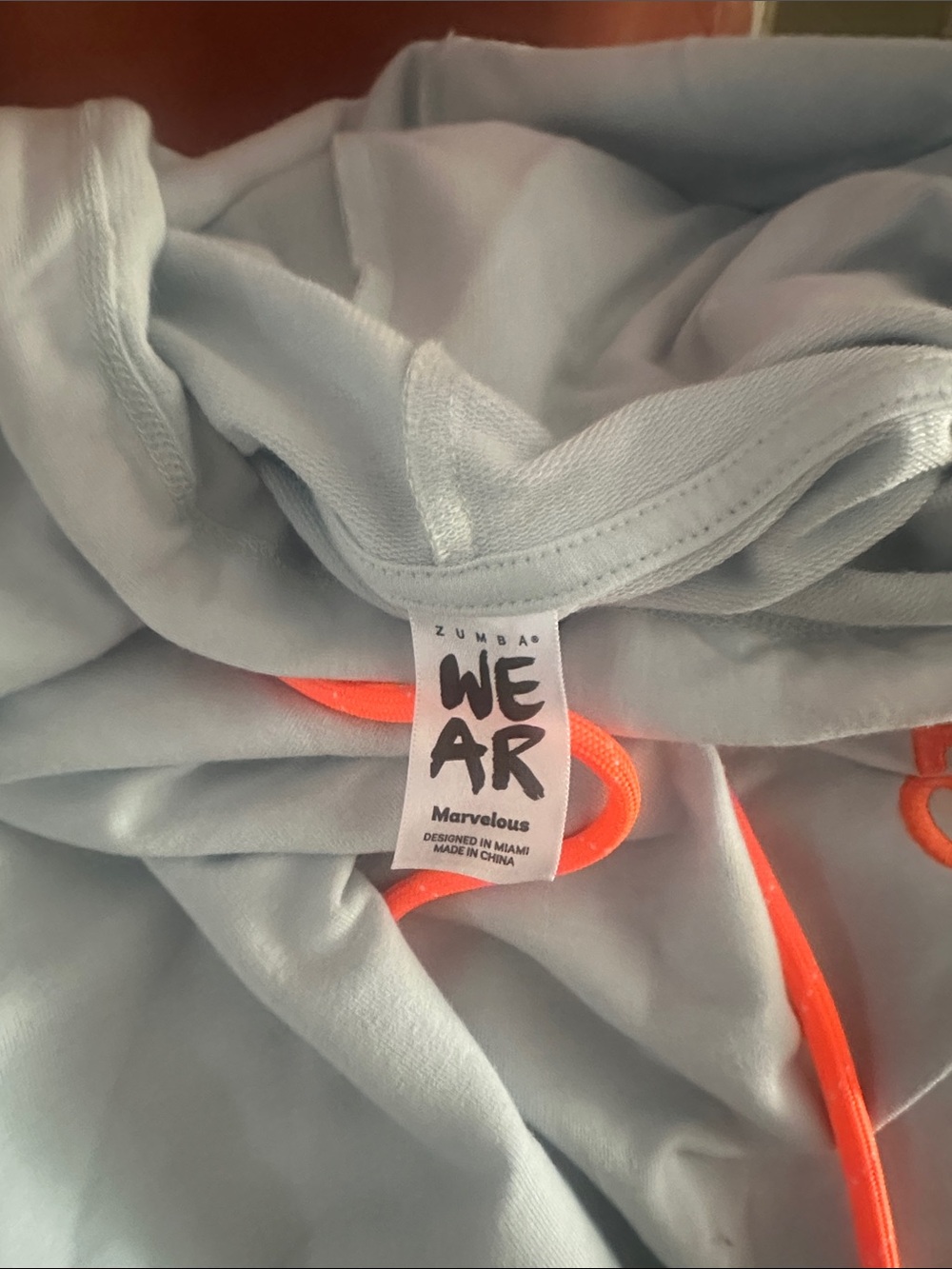 Zumba Fitness Light Blue Hoodie with Neon Orange Logo - Picture 4 of 5
